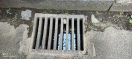 Foto: Strassenablauf verstopft 