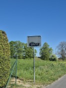 Foto: Ortsausgangsschild Richtung kleine Brücke  