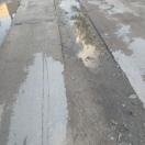 Neuruppin: Ausgefahrene Straße   Foto: Ausgefahrene Straße