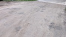 Foto: Defekte Straße durch DB arbeiten 