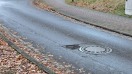 Foto: Einfassung  Abwasserdeckel 