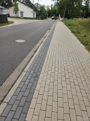 Foto: Verdreckte Straße/Fußgängerweg 