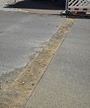 Foto: Schlaglöcher nach Bauarbeiten 