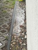 Foto: Defekte Regenwassermulde 