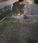 Foto: Strassenablauf frei, aber kaum Ablauf  