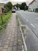 Foto: Reinigung Gehweg und Rinnstein  