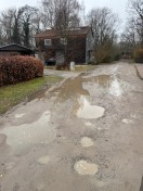 Foto: Schlaglöcher nach wie vor 