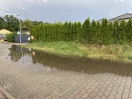 Foto: Überschwemmung der Strasse nach Starkregen  