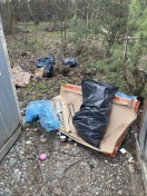 Foto: Müllablagerungen am Glascontainer  