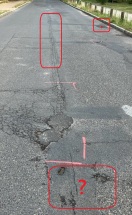 Foto: Unvollständige Markierung der Asphalt-Schäden am Steinweg / Schule 